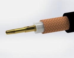 Close-up showing a female center contact receptacle securely crimped onto the central core wire of a coaxial cable.